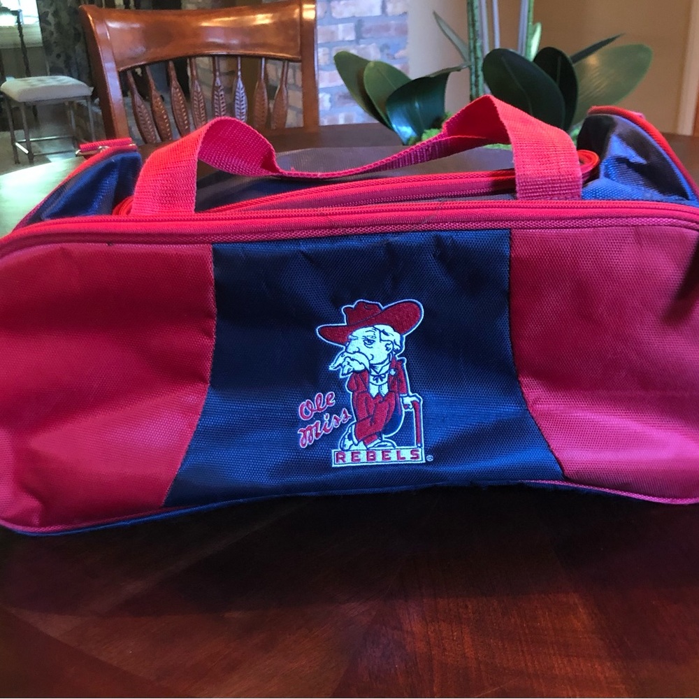 Ole Miss duffle bag. Navy with red logo.